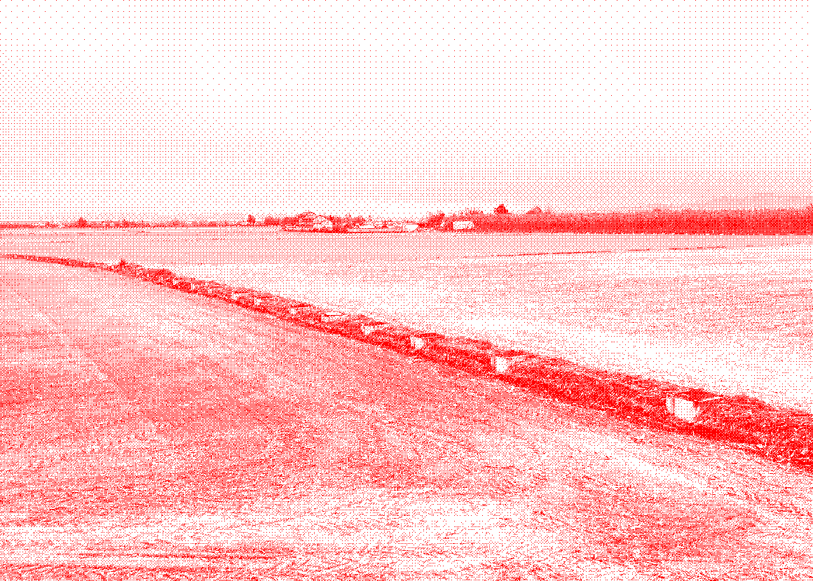 Former open ditch replaced by underground piping across cultivated fields.