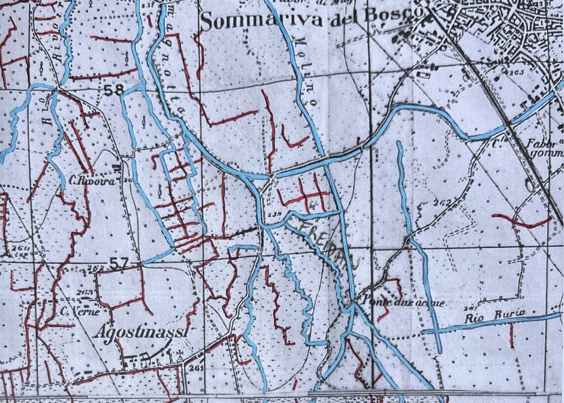 Historical map with blue-marked waterways and red intervention lines across the landscape.